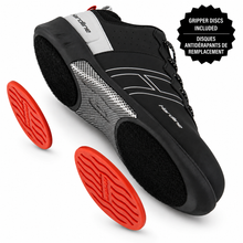 Load image into Gallery viewer, A black and silver curling shoe with red anti-tire grip discs shown floating beside it on a white background, plus a black badge that reads 'GRIPPER DISCS INCLUDED'.