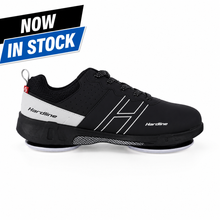 Load image into Gallery viewer, A black Hardline curling shoe with white accents and logo detailing, shown in a side profile on a white background with a 'NOW IN STOCK' banner in the top left corner.